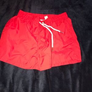 Red swim shorts